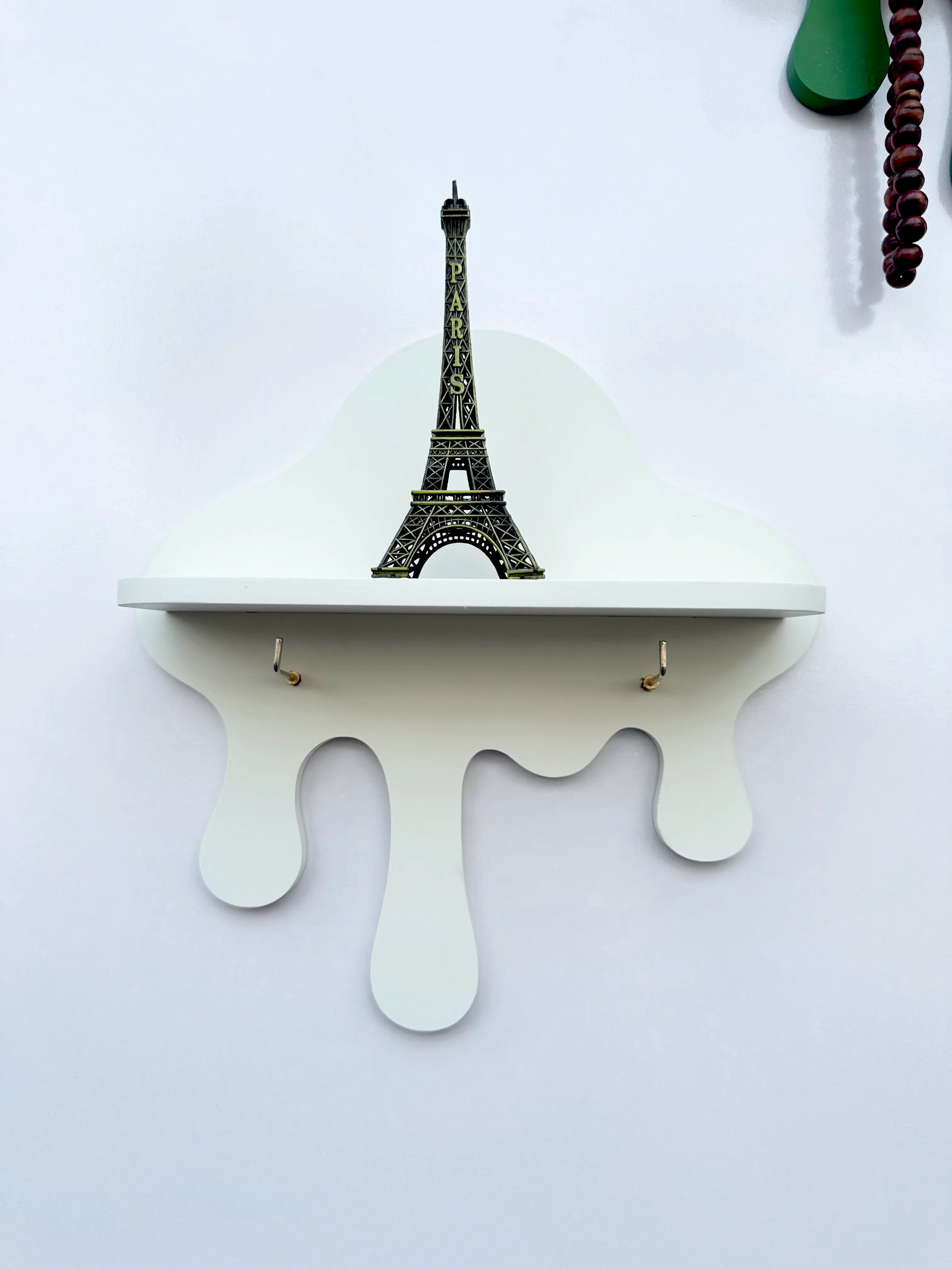 off white drip wall shelf with golden key hooks