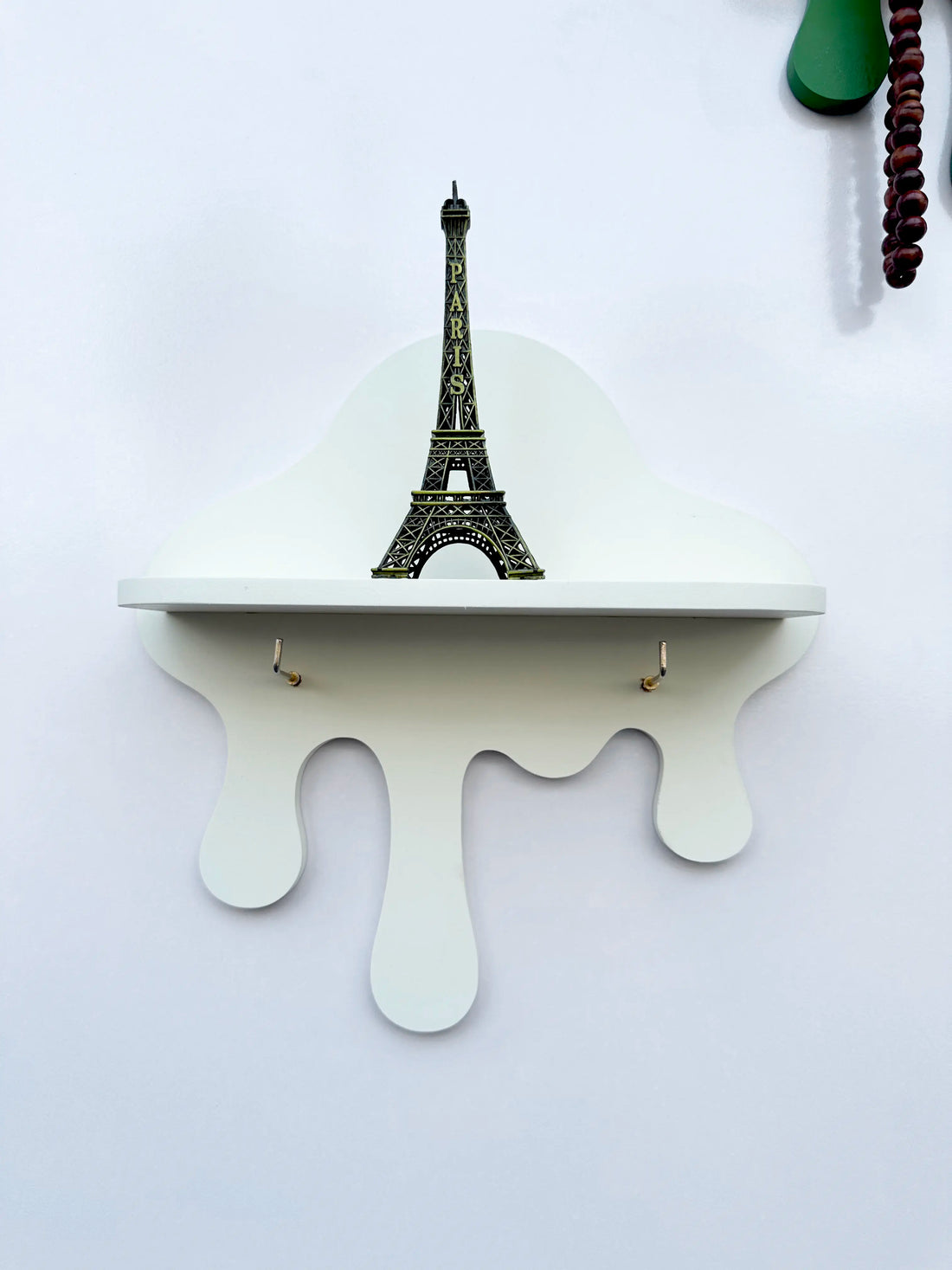 off white drip wall shelf with golden key hooks